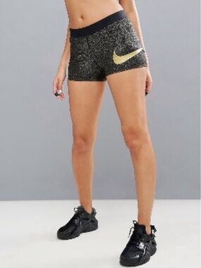 Nike Pro Women's 3-inch Dri-FIT Athletic Shorts. Black with gold shimmer